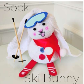 Sock Bunny with red skis and red scarf and blue ski goggles